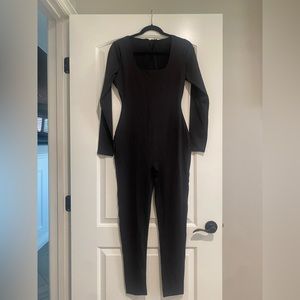Skims black full body suit